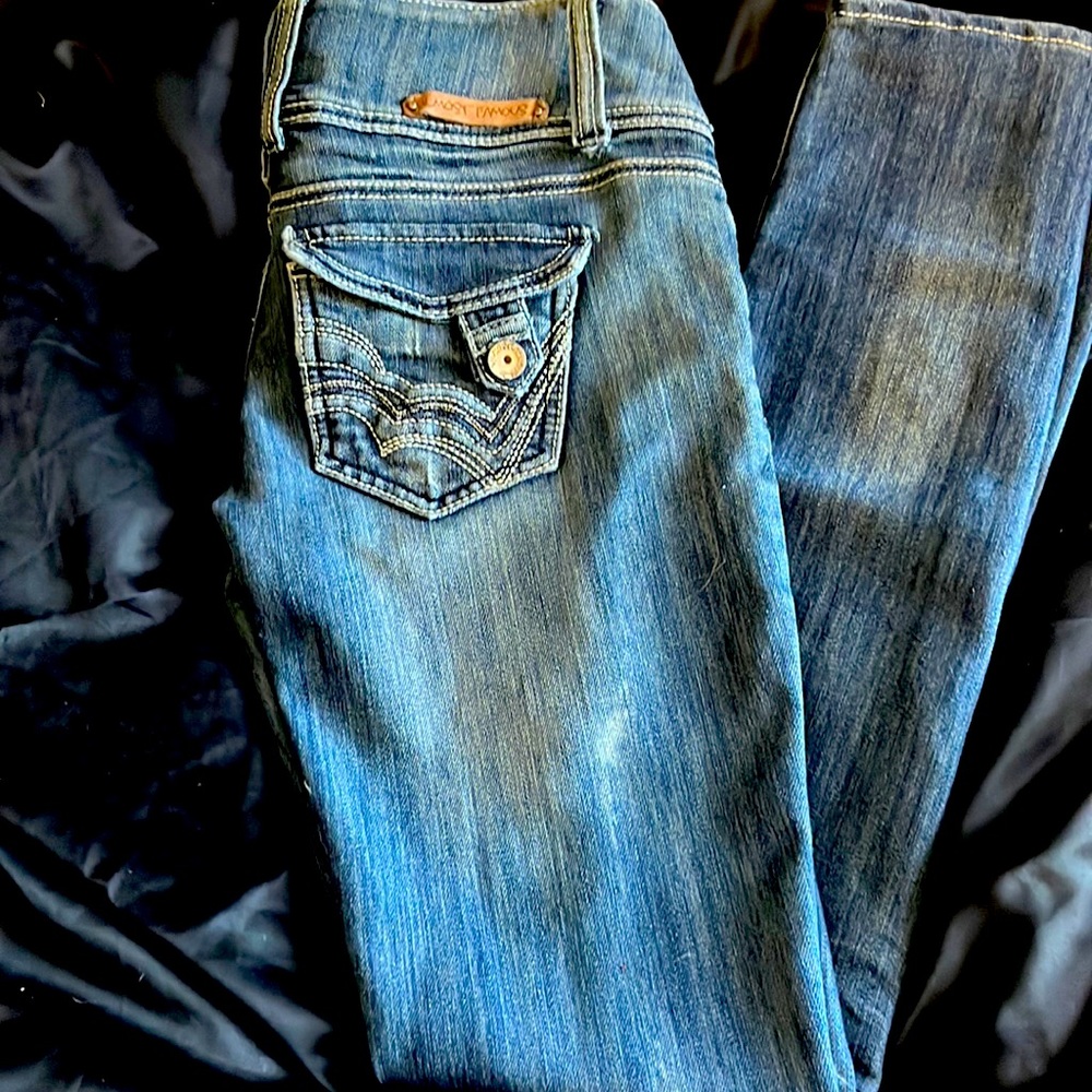 Distressed Almost Famous stretch skinny jeans
